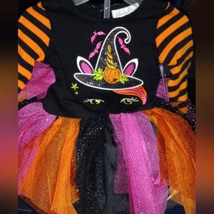 Halloween outfit for a baby girl.